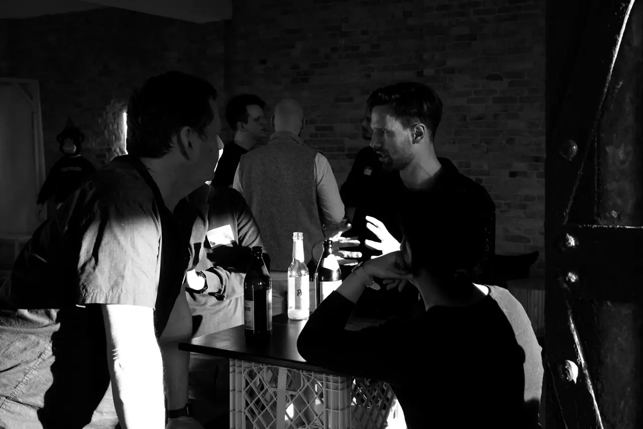 Attendees in conversation