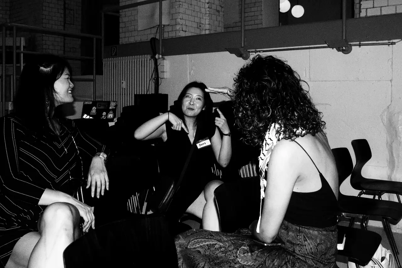 Attendees in conversation